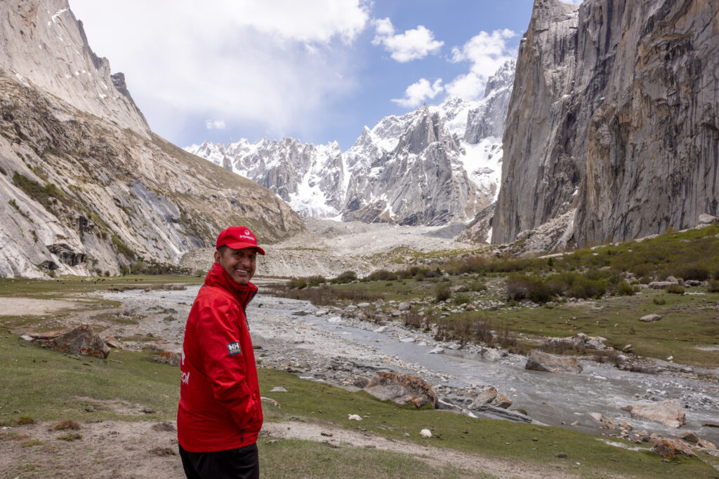 Muneer Alam surveying the Karakoram landscape, decades of mountain experience in every step
